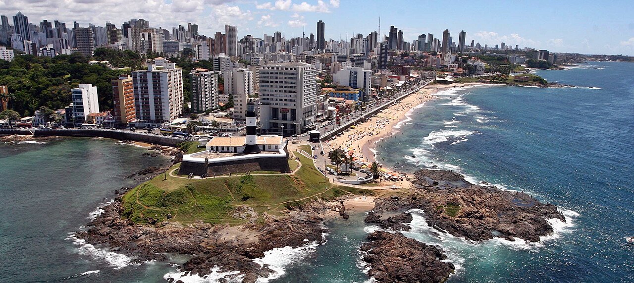 The Barra Lighthouse and Salvador's skyline along the coast